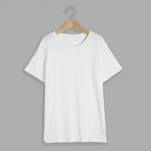 Close-up detail of a minimalist plain white crew neck cotton T-shirt hanging on a wooden hanger