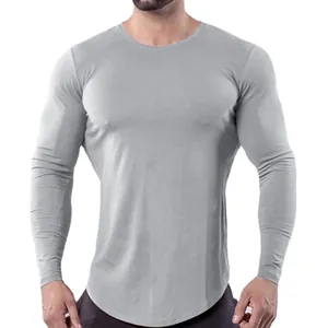 T-shirt de sport gris à manches longues pour homme en tissu extensible à séchage rapide