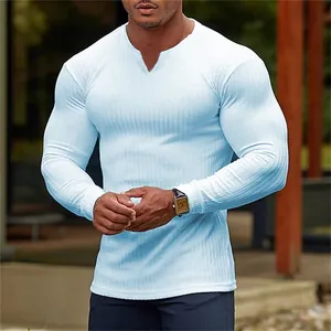 Men's athletic slim fit light blue ribbed long sleeve T-shirt with comfortable cotton texture