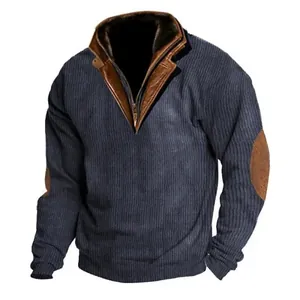 Detail view of navy blue ribbed sweater with brown faux-leather collar and elbow patches