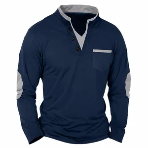 Detail of navy blue long sleeve t-shirt featuring grey spliced collar and chest pocket