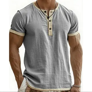 Close-up of vintage grey Henley shirt with contrast beige trim and textured fabric