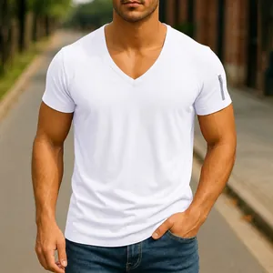 Close-up detail of a white V-neck short-sleeved T-shirt on a muscular male model outdoors.