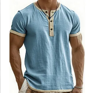 Detailed view of a vintage men's blue Henley short sleeve t-shirt with beige contrast trims