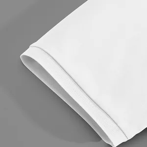 Macro view showing the ribbed cuff and piqué knit texture of a white men's polo shirt