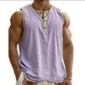 Close-up detail of men's purple fitness tank top with button collar and sports texture.