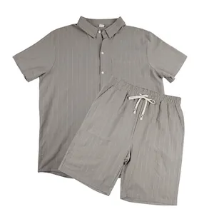 High-quality close-up of men's grey pinstriped linen short sleeve shirt and shorts set