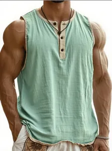 Close-up of men's mint green fitness tank top with 3-button henley and breathable fabric