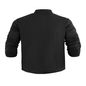 Macro view of the breathable fabric on the back of a black men's long sleeve polo shirt.