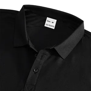 Close-up of black breathable Polo shirt collar showing buttons and size label tag