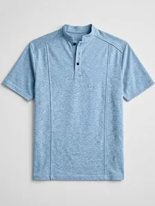 Detail view of light blue men's knit polo shirt featuring a stand collar and button placket.