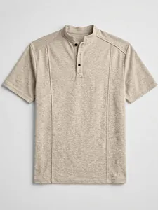 Detailed view of oatmeal heathered men's henley shirt with stand collar and buttons