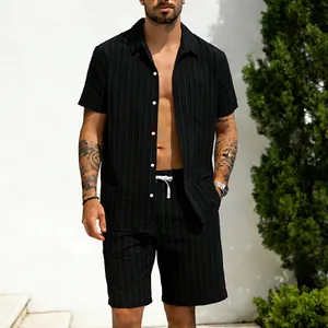 Casual men's pinstripe linen shirt and shorts set styled for a summer vacation look.