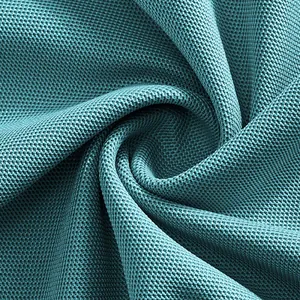 Close-up of teal breathable piqué fabric for quick-dry men's long-sleeve polo shirt