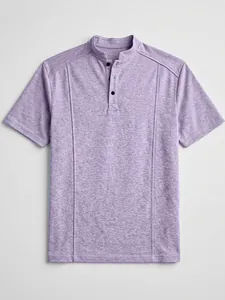 Macro view of heathered lavender knit shirt with stand collar and button placket