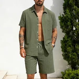 Stylish olive green linen pinstripe short sleeve shirt and matching shorts set on a male model
