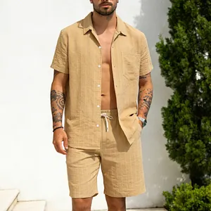 Detail view of men's beige linen striped shirt and shorts set for a relaxed summer style.