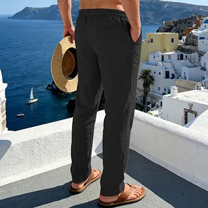 Back view of men's loose breathable linen trousers in black for summer vacation