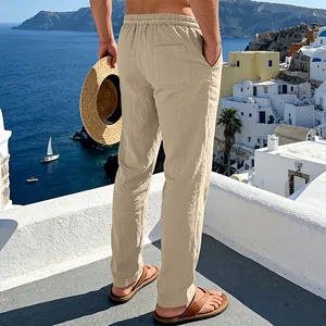 Back view of men's loose beige linen straight-leg pants for casual summer vacation style
