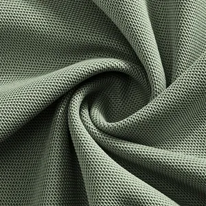 Close-up of breathable pique fabric texture for men's long-sleeve polo shirt