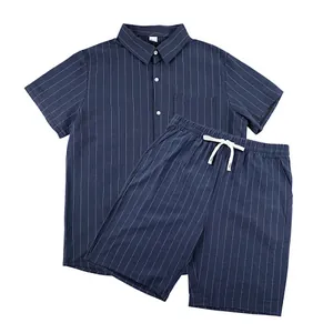 Detail view of men's navy striped linen shirt and shorts casual summer outfit set.