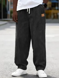 Men's loose straight-leg corduroy casual trousers with white drawstring and pocket detail