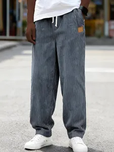 Men's stylish blue corduroy straight-leg casual trousers featuring an adjustable drawstring waist