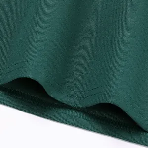 Close-up of heavy cotton-like men's Polo shirt with piqué mesh texture and fine stitching