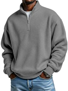 Men's relaxed fit waffle knit quarter-zip sweatshirt in grey, professional studio shot.