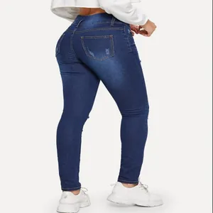 Detailed back view of women's dark blue skinny ripped jeans with pocket accents