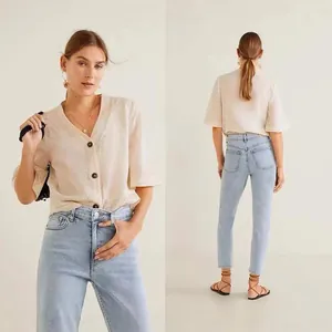 Front and back views of high-waisted light blue slim straight denim jeans for women