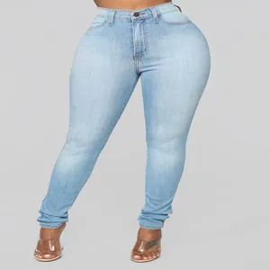 Detailed view of women's light blue high-waist stretch skinny jeans highlighting fit