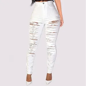 Women's high waisted ripped white skinny jeans with trendy distressed denim details