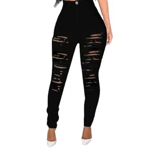 High-waisted black ripped skinny jeans with distressed details for a slim fit appearance