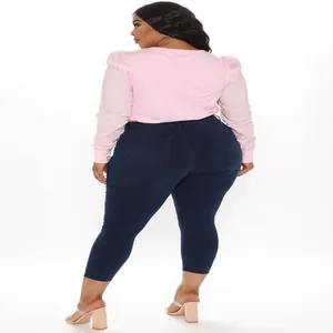 Pantaloni skinny in denim blu scuro taglie forti da donna vista posteriore