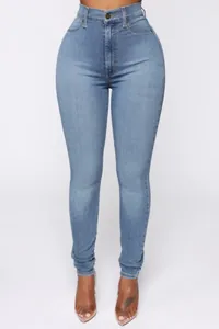Vista frontal detallada de vaqueros pitillo elásticos de talle alto azul claro mujer