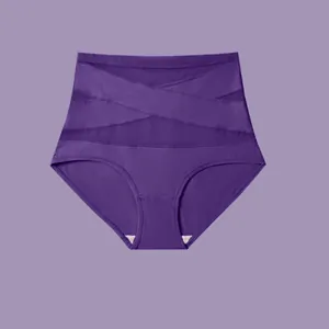 Detailed view of purple high-waisted shapewear showing the mesh crisscross panels.