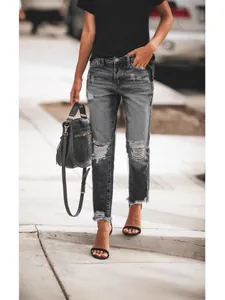 Stylish women's distressed straight-leg denim jeans featuring charcoal wash and raw hem