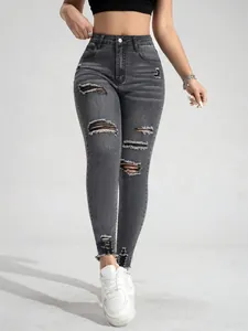 Graue Ripped Skinny Jeans mit Destroyed-Details und ausgefranstem Saum