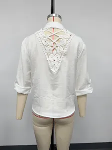 Back detail of a white casual shirt featuring elegant lace crochet and stylish lace-up cutout design