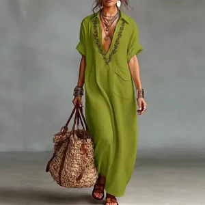 Casual green cotton linen maxi dress with embroidered V-neck and large side pocket