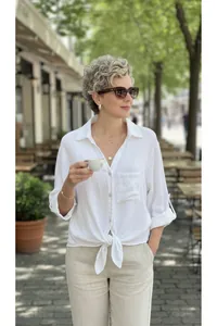 Elegant white tie-front button-down shirt with V-neck and casual rolled sleeves for summer
