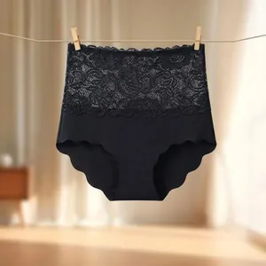 High-waisted black modal panties with wide floral lace waistband and seamless scalloped edges