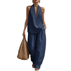 Elegantes Set aus dunkelblauem Neckholder-Oberteil mit V-Ausschnitt und weiter Hose