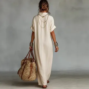 Full-back view of a loose-fitting beige cotton linen maxi dress with a collar for women