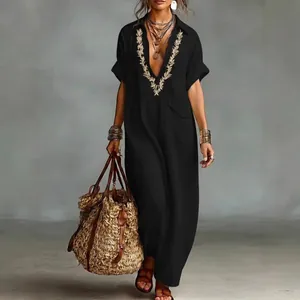 Elegant loose black cotton linen maxi dress featuring embroidered V-neck and pockets