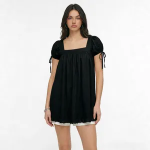 Elegant black square neck blouse with puff sleeves and tie details for modern women fashion.