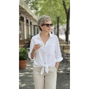 Stylish women's white V-neck tie-front button shirt for a casual outdoor lifestyle