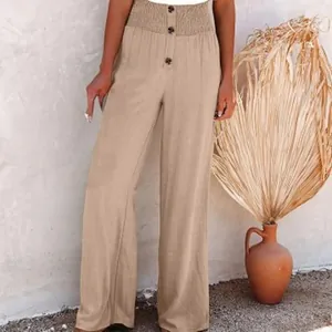 Detailed view of women's khaki cotton linen wide leg trousers with elastic high waist.