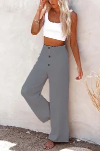 Detail view of grey cotton linen wide leg pants with elastic high waist and buttons